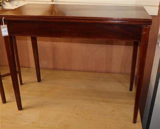 A George III strung mahogany tea table W.90cm